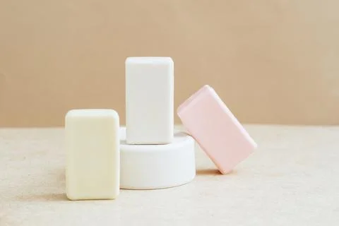 Bars of soap made from natural raw materials beige background. Organic cosmetics Stock Photos