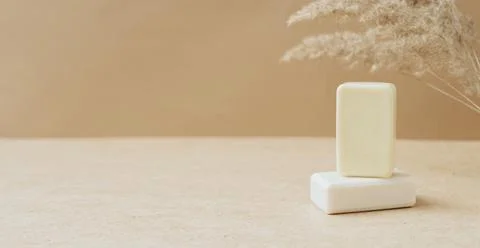 Bars of soap made from natural raw materials beige background. Organic cosmetics Stock Photos