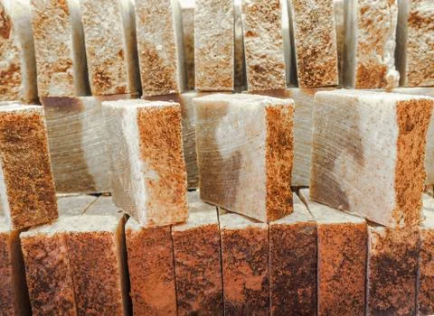 Bars of soap on a shop window. Cinnamon soap with natural cedar oil and herbal Stock Photos