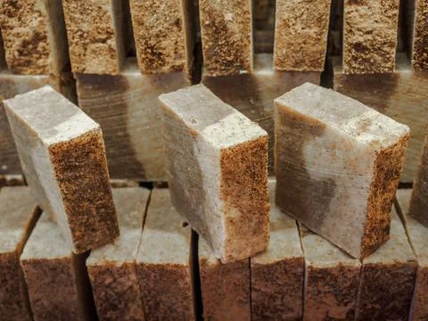Bars of soap on a shop window. Cinnamon soap with natural cedar oil and herbal Stock Photos
