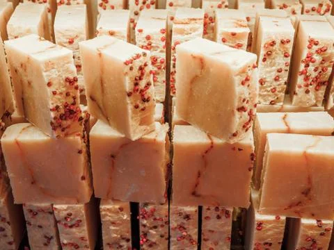 Bars of soap on a shop window. Fruit soap with natural cedar oil and herbal Stock Photos