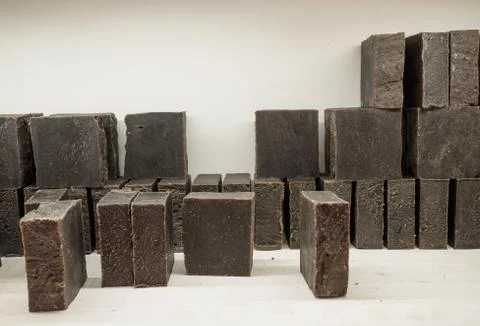 Bars of soap on a shop window. Tar soap with natural cedar oil, turpentine and Foto stock