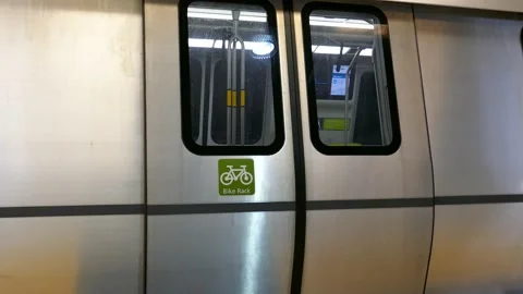 BART metro train doors closing for departure from San Francisco Stock Footage 139827003