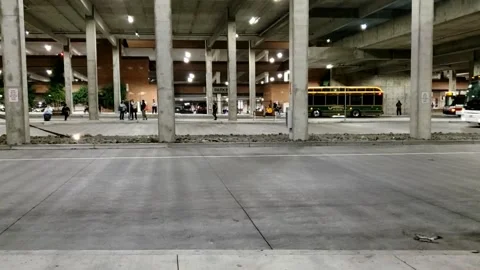 BART Station is well illuminated at night for bus passenger safety. Stock Footage 322073586
