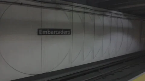 BART subway train passing through station Stock Footage 252352434