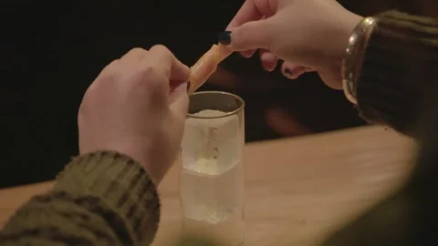 Bartender Adding Citrus Garnish to Cocktail in Bar, Beijing, China Stock Footage 345746819
