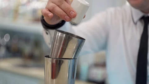 Bartender adds salt and pepper to bloody mary. Close up Stock Footage 101966129