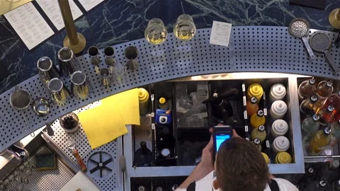 Bartender at the bar counter top view. Video stock 119708273