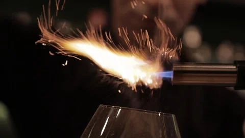 Bartender Beautifuly Using Torch Stock Footage 129780301