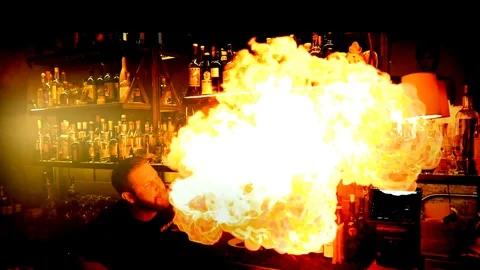 Bartender blowing fire! Stock Footage 95008647