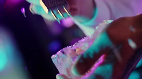 Bartender breaks the ice by pick Stock Footage 196981958