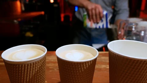 Bartender brews coffee for takeaway. 스톡 동영상 94562518