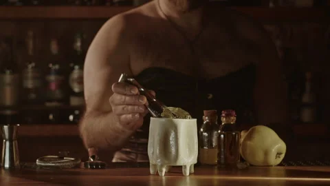 Bartender is chilling a ceramic glass Stock Footage 263594214
