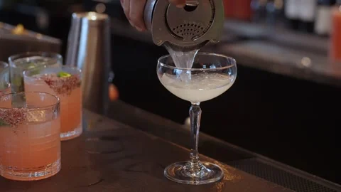 Bartender Creates Beverage, Mixologist Meticulously Prepares Mint Grapefruit Stock Footage 323778349