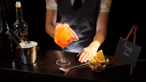 Bartender decorating cocktail glass Stock Footage 126491117