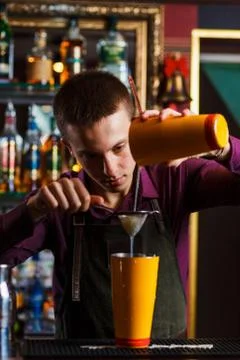 The bartender drain cocktail Stock Photos