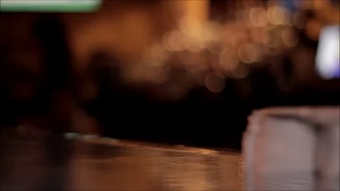 Bartender drinks and coasters in dark bar Stock Footage 71357693