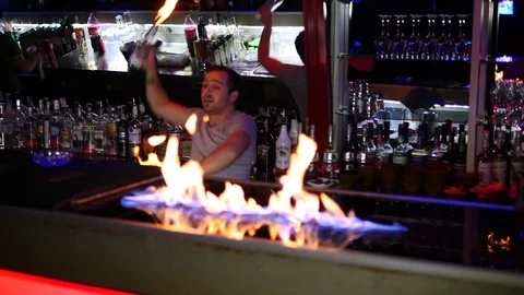 Bartender gangs with burning bottles, bartender fire show Stock Footage 98263017