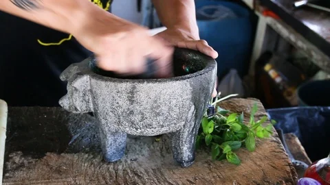 Bartender Grinds up Mint for Mojito (Close Up) - Cozumel, Mexico Stock Footage 88114624