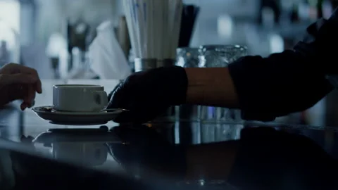 Bartender hands giving espresso cup to client closeup. Barista serving hot drink Video stock 201895127