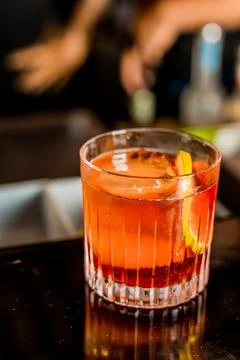 Bartender Hands Making a Perfect Drink on Bar Gin Tonic Negroni Caipirinha Mosco Stock Photos