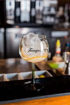 Bartender Hands Making a Perfect Drink on Bar Gin Tonic Negroni Caipirinha Mosco Stock Photos