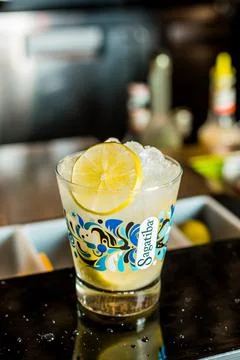 Bartender Hands Making a Perfect Drink on Bar Gin Tonic Negroni Caipirinha Mosco Stock Photos