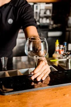 Bartender Hands Making a Perfect Drink on Bar Gin Tonic Negroni Caipirinha Mosco Stock Photos