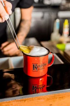 Bartender Hands Making a Perfect Drink on Bar Gin Tonic Negroni Caipirinha Mosco Stock Photos