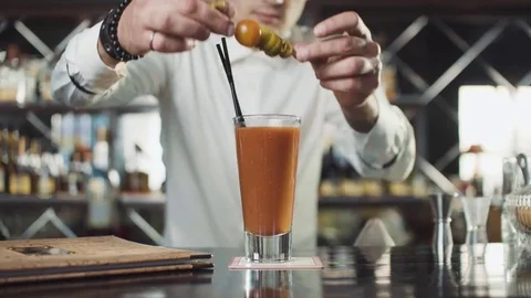 Bartender in hat is preparing cocktail in bar Stock Footage 75241515