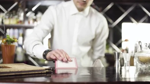 Bartender in hat is preparing cocktail in bar Stock Footage 75241609