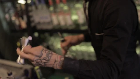 Bartender Jigger's Trick and Pouring Campari Stock Footage 129780192