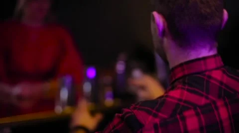 Bartender juggling bottles at the bar Stock Footage 61838510