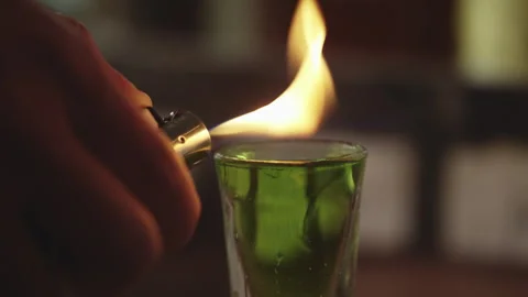 Bartender light shot with lighter Stock Footage 274627691