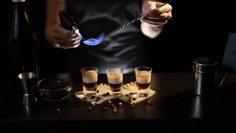 Bartender lighting B-52 cocktail Stock Footage 128736031