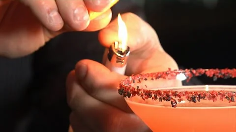 Bartender lights martini on fire Stock Footage 20462361