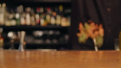 Bartender made some alcohol shots for guests close-up, cheers celebrate. Night Stock Footage 253577629