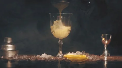 Bartender make a cocktail at bar Stock Footage 118980664