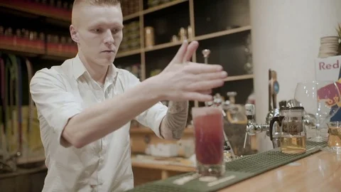 Bartender makes a cocktail close-up Stock Footage 76567644