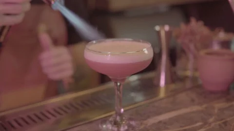 The Bartender Makes A Cocktail Of Fire. The Barman Ignites Stock Footage 109345255