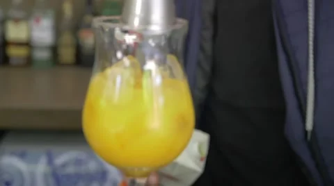 The bartender makes a cocktail of fire Stock Footage 67606458