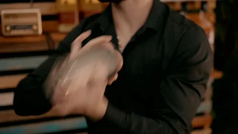 A bartender makes a cocktail in a shaker Video stock 244259224
