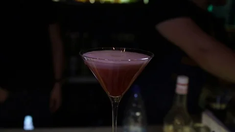 Bartender makes a cocktail with strawberry pulp Stock Footage 125472903