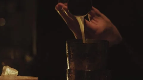Bartender makes elegant cocktail tonight Stock Footage 276627189