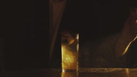 Bartender makes elegant cocktail tonight Stock Footage 276627686
