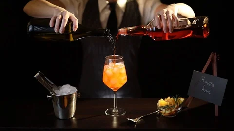 Bartender making Aperol spritz cocktail Stock Footage 124752681