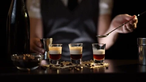 Bartender making B-52 cocktail Stock Footage 126610957