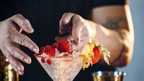 Bartender making a beautiful straberry cocktail Stock Footage 83622047