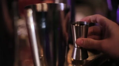 Bartender making a cocktail at the bar Stock Footage 61838951