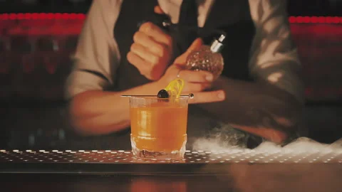 Bartender making a cocktail at the bar Stock Footage 219026730